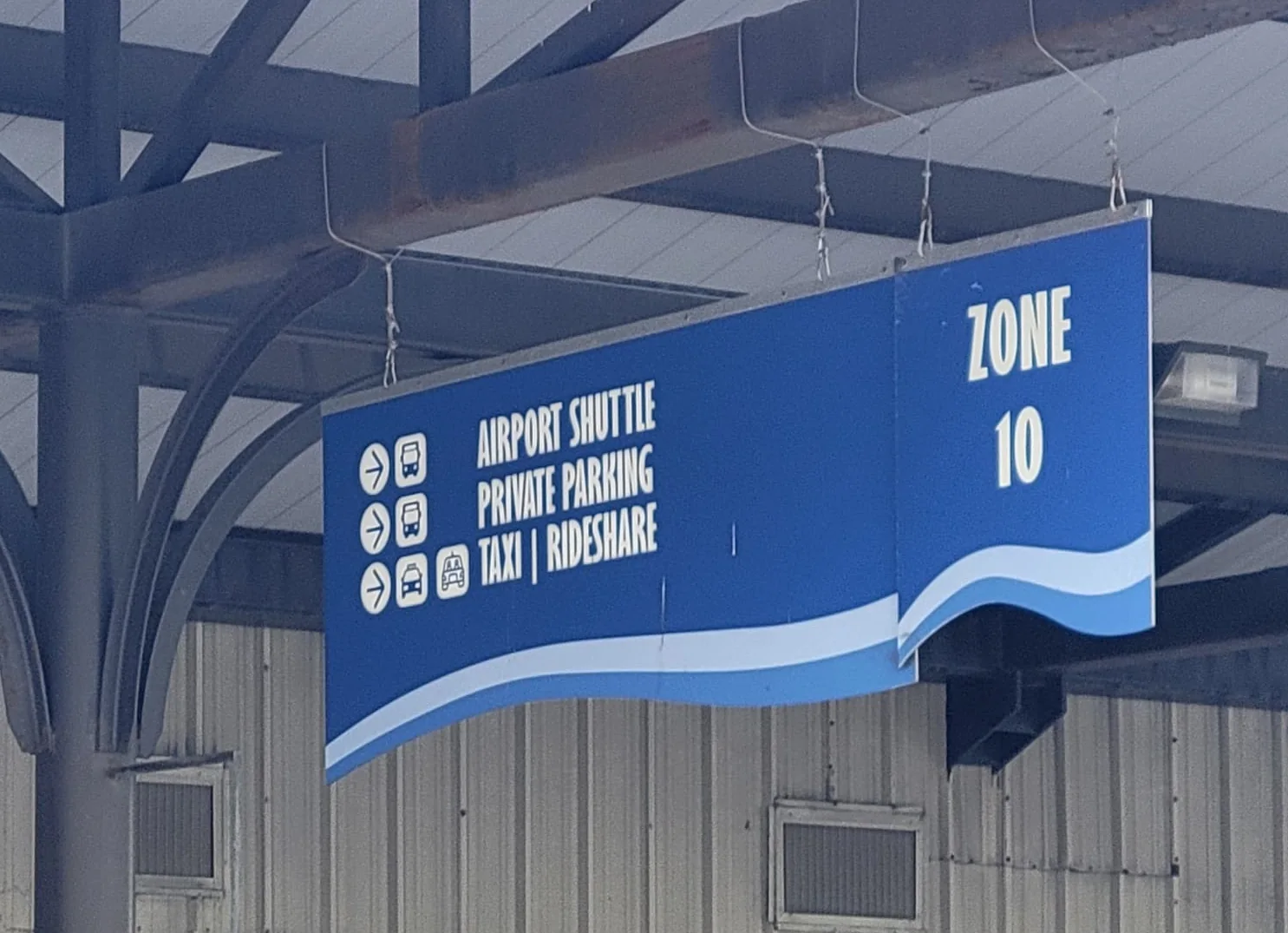 Zone 10 airport shuttle pickup sign at Galveston Cruise Terminal 28