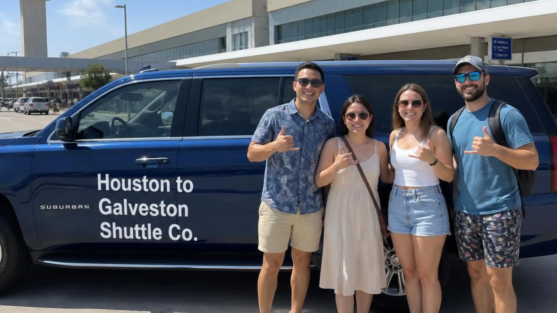 A group of four beside a Houston to Galveston Shuttle Co. navy Suburban at William P. Hobby Airport