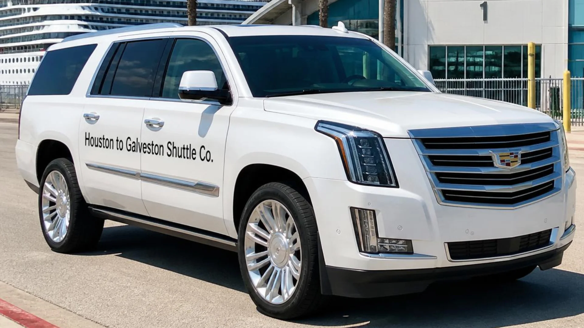 Houston to Galveston Shuttle Co. white private SUV parked at a Galveston cruise terminal on Harborside Drive