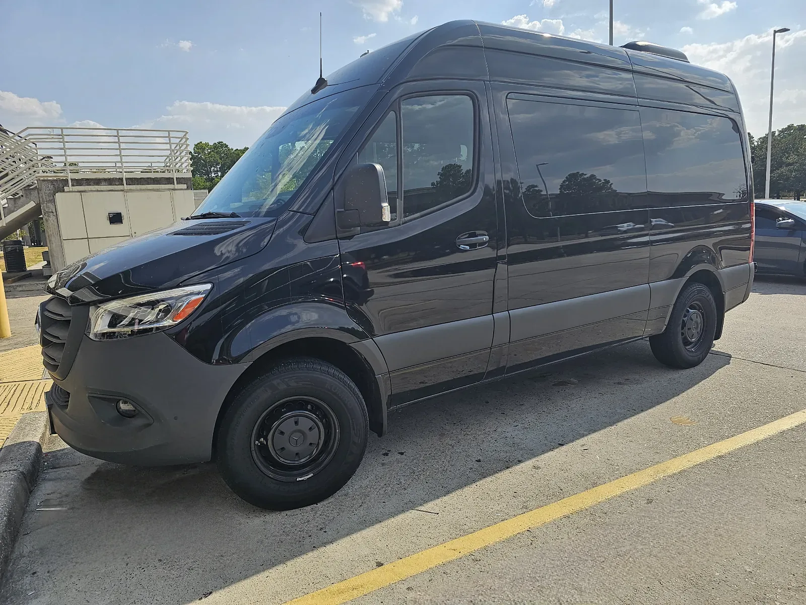 Mercedes-Benz Sprinter high-roof van used for large group transfers to the Galveston cruise port